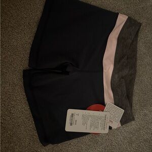 Lululemon Athletica Black and Pink Athletic Shorts